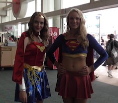 Wonder Woman and Supergirl cosplayers at San Diego Comic-Con 2013.