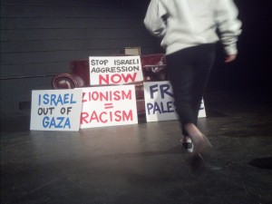 Hannah's protest signs, props for Heresy at Wilbury Group. (Photo: Michael Bilow)